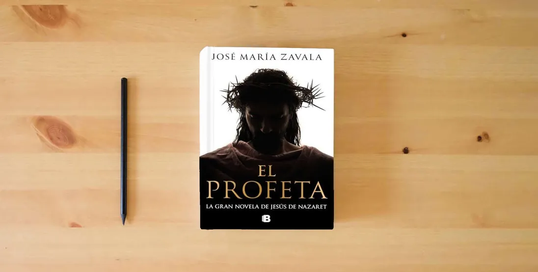 The book El profeta (Histórica)} is on the table
