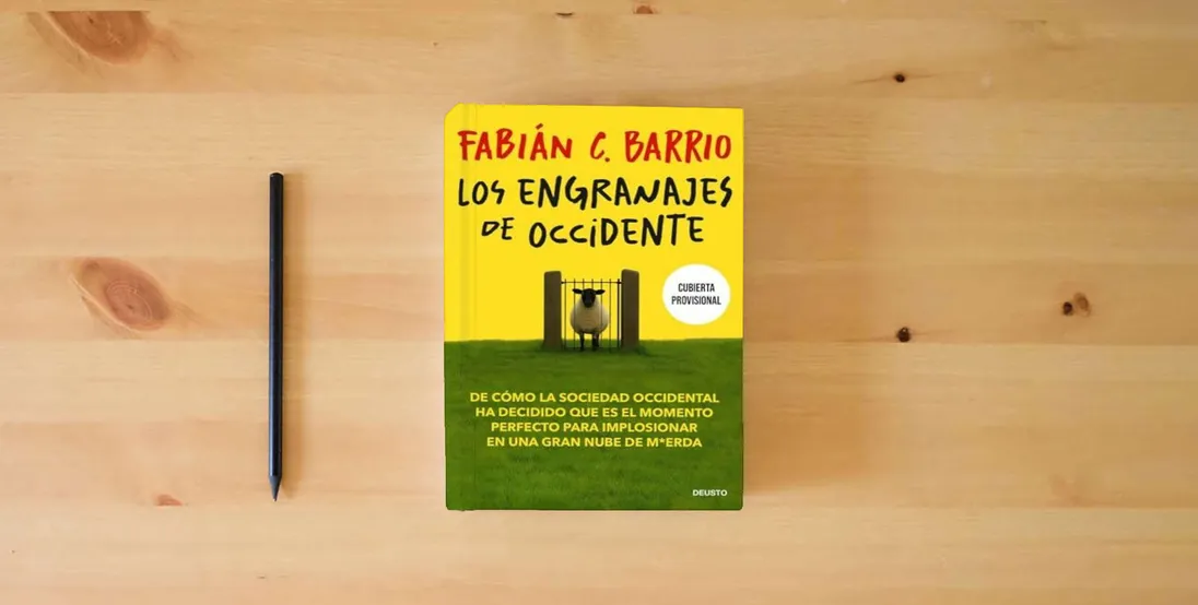 The book ENGRANAJES DE OCCIDENTE, LOS (DEUSTO)} is on the table