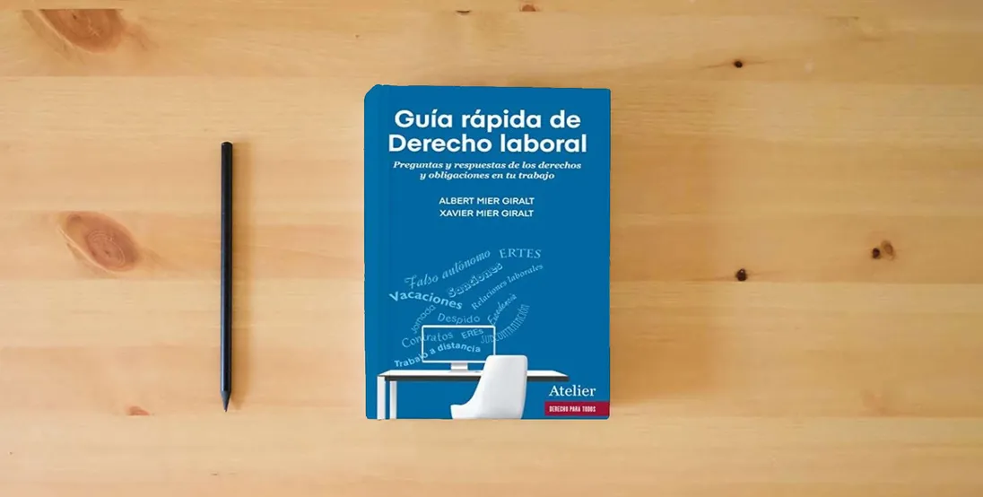 The book Guía rápida de Derecho laboral. (SIN COLECCION)} is on the table