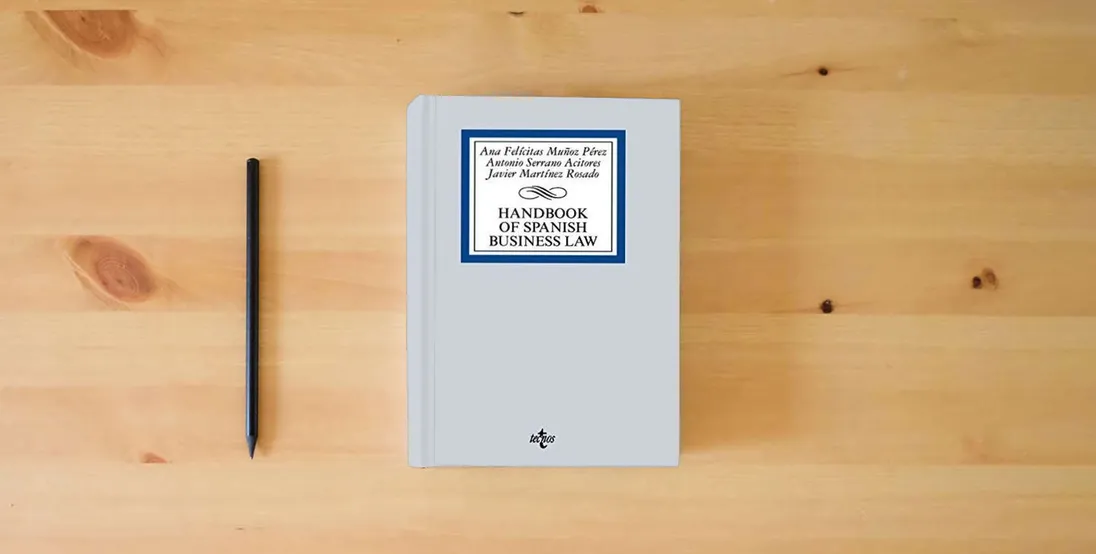 The book Handbook of Spanish Business Law} is on the table