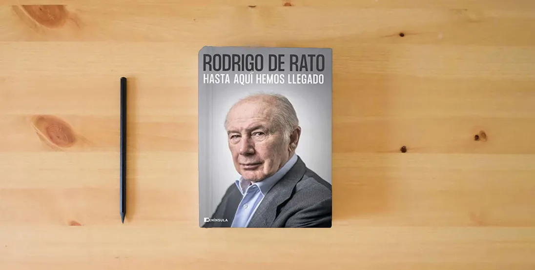 The book Hasta aquí hemos llegado (PENINSULA)} is on the table