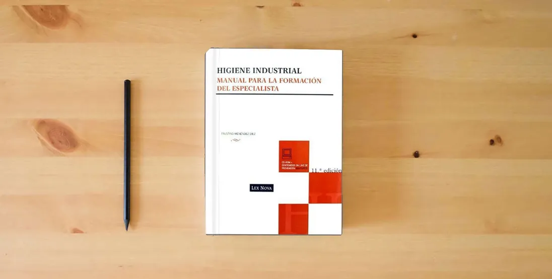 The book Higiene industrial} is on the table
