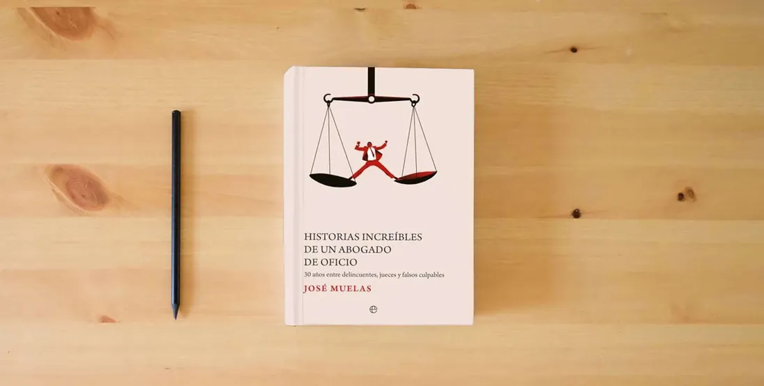 The book Historias increíbles de un abogado de oficio: 30 años entre delincuentes, jueces y falsos culpables} is on the table