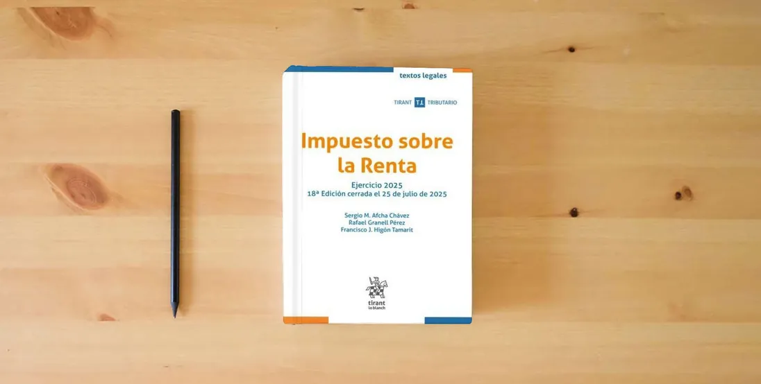 The book Impuesto sobre la Renta. Ejercicio 2025 18ª Edición cerrada el 25 de julio de 2025 (Textos legales Tirant Tributario)} is on the table