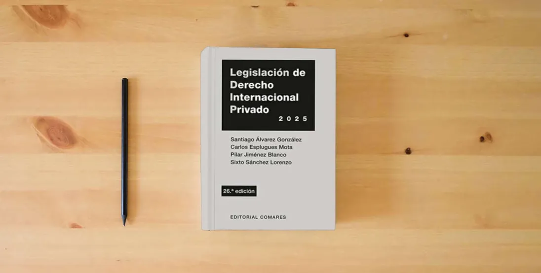 The book Legislación de derecho internacional privado (26 ed.)} is on the table