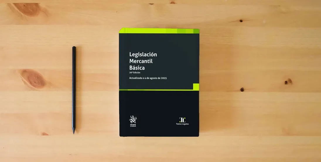 The book Legislación Mercantil Básica 26ª Edición Actualizada a 4 de agosto de 2025} is on the table