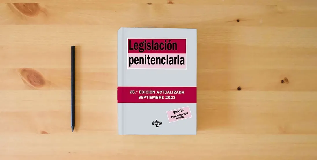 The book Legislación penitenciaria (Derecho - Biblioteca de Textos Legales)} is on the table
