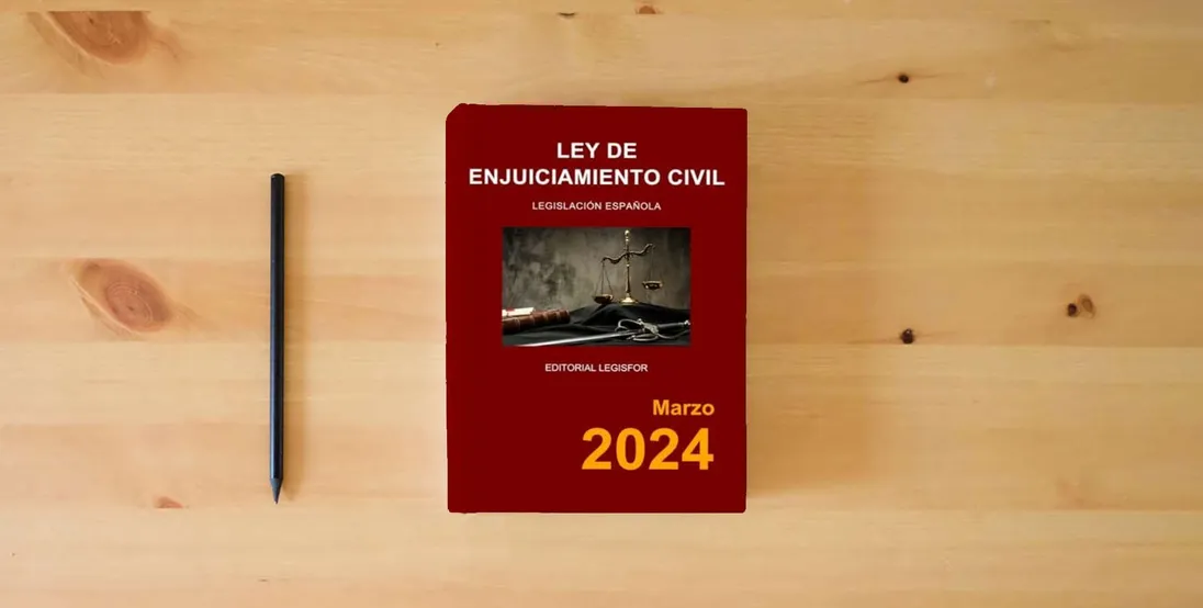 The book Ley de Enjuiciamiento Civil} is on the table