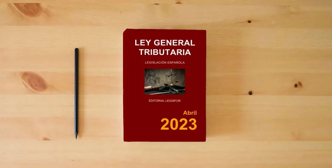The book Ley General Tributaria} is on the table
