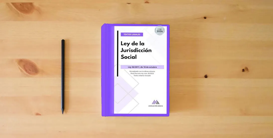 The book Ley de la Jurisdicción Social: Legislación Básica actualizada. Textos legales} is on the table