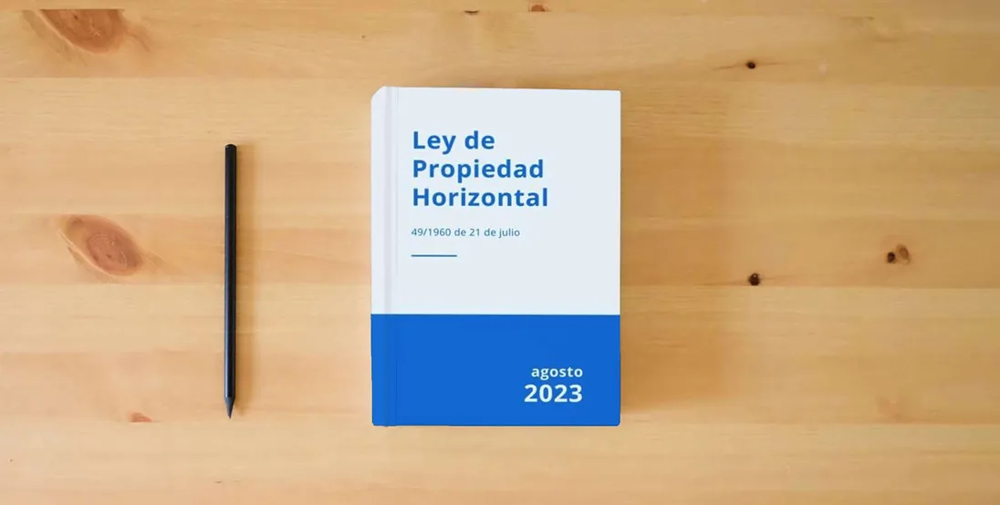 The book Ley de Propiedad Horizontal: 49/1960, de 21 de julio} is on the table