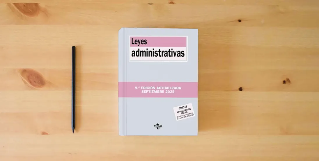 The book Leyes administrativas (Derecho - Biblioteca de Textos Legales)} is on the table