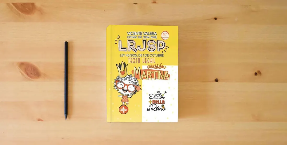 The book LRJSP Versión Martina: Ley 40/2015 de 1 de octubre. Texto Legal (Derecho - Práctica Jurídica)} is on the table