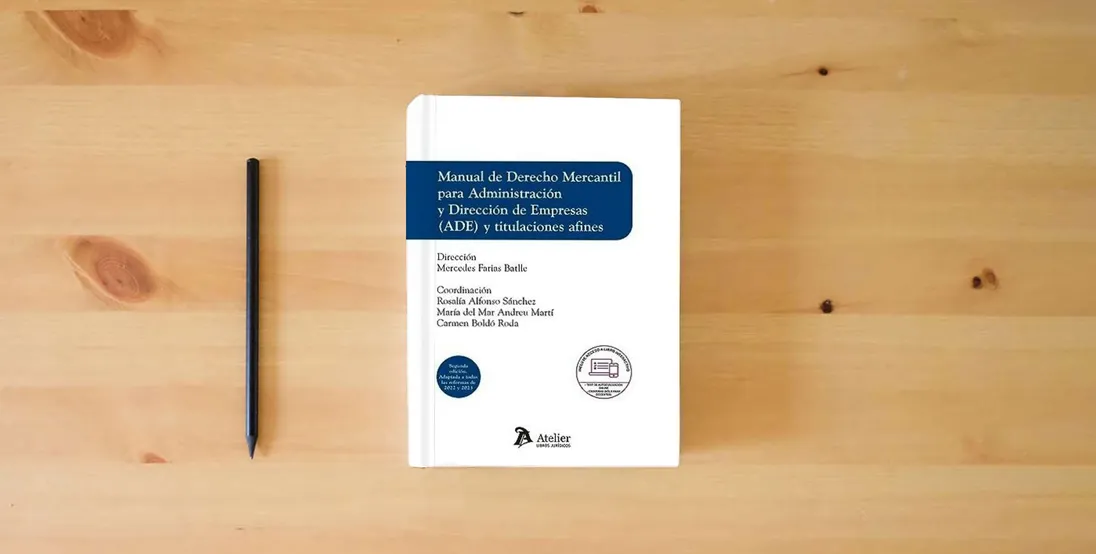 The book Manual de Derecho Mercantil para Administración y Dirección de Empresas (ADE) y titulaciones afines. (MANUALES)} is on the table