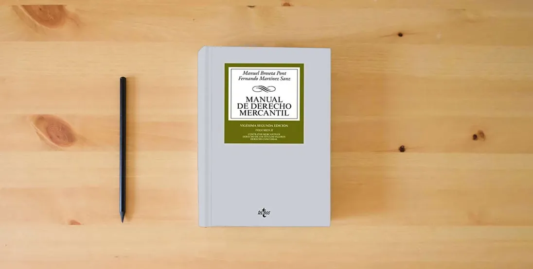 The book Manual de Derecho Mercantil: Vol. II. Contratos mercantiles. Derecho de los títulos-valores. Derecho Concursal} is on the table
