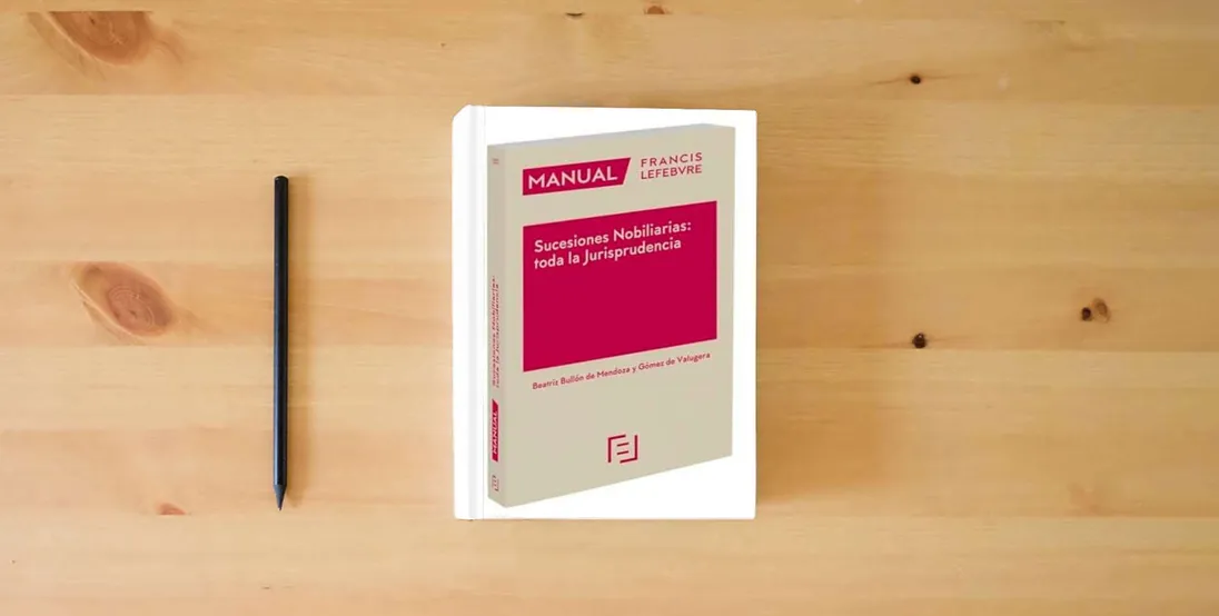 The book Manual Sucesiones Nobiliarias: Toda la Jurisprudencia (MANUALES)} is on the table