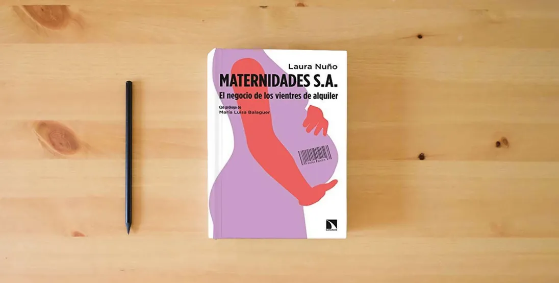 The book Maternidades s.a: El negocio de los vientres de alquiler: 770 (COLECCION MAYOR)} is on the table