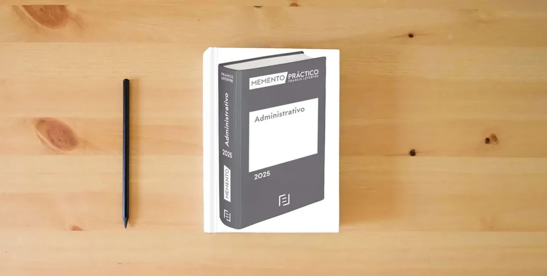 The book Memento Administrativo 2025 (MANUALES)} is on the table