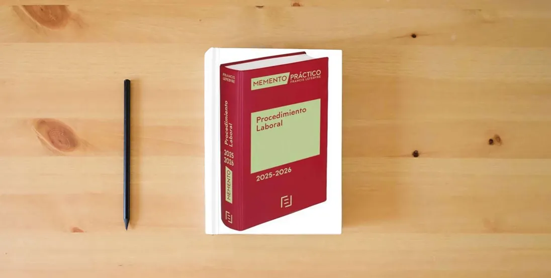 The book Memento Procedimiento Laboral 2025-2026 (MANUALES)} is on the table
