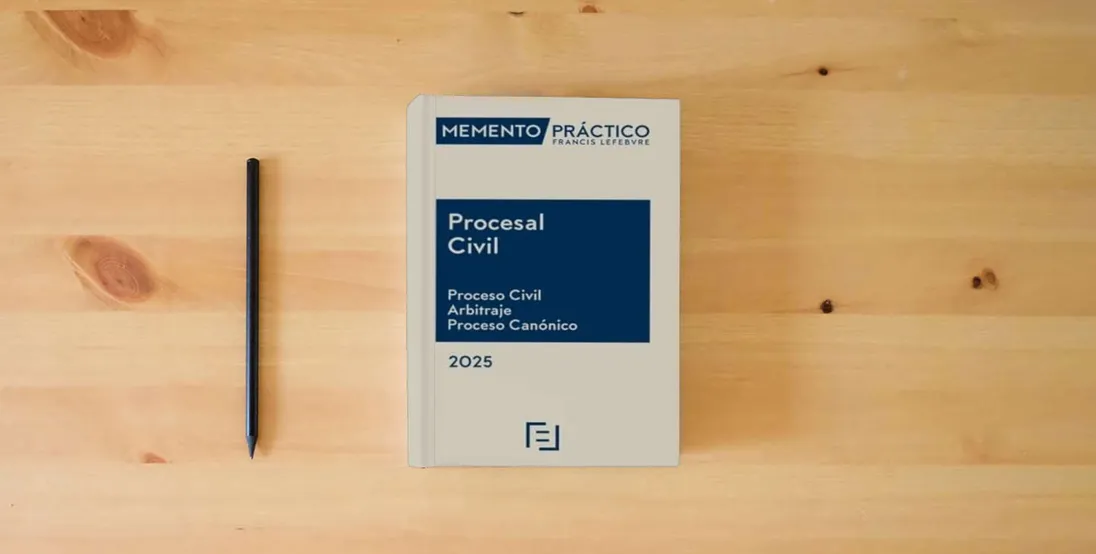 The book Memento Procesal Civil 2025 (MANUALES)} is on the table