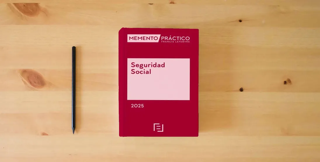 The book Memento Seguridad Social 2025 (MANUALES)} is on the table