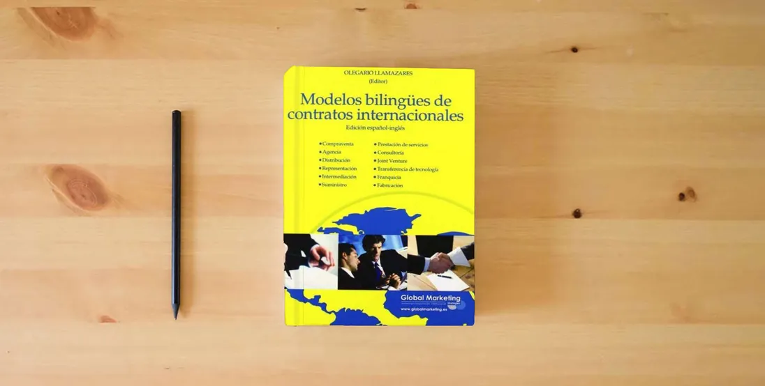 The book Modelos Bilingues De Contratos In (ECONOMIA)} is on the table