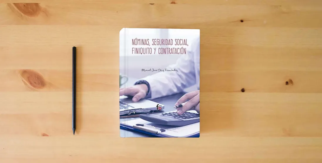 The book Nóminas, Seguridad Social, Finiquito y Contratación, Colección Empresa} is on the table