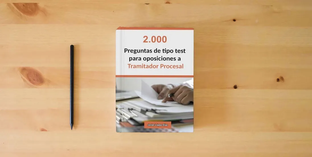 The book Oposiciones a Tramitador Procesal: 2.000 Preguntas de Tipo Test Resueltas para Preparar el Examen} is on the table