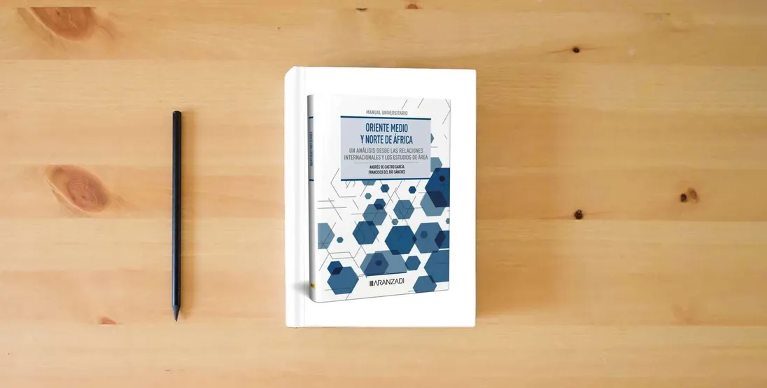 The book Oriente Medio y Norte de África: un análisis desde las Relaciones Internacionales y los Estudios de Área (Manuales)} is on the table
