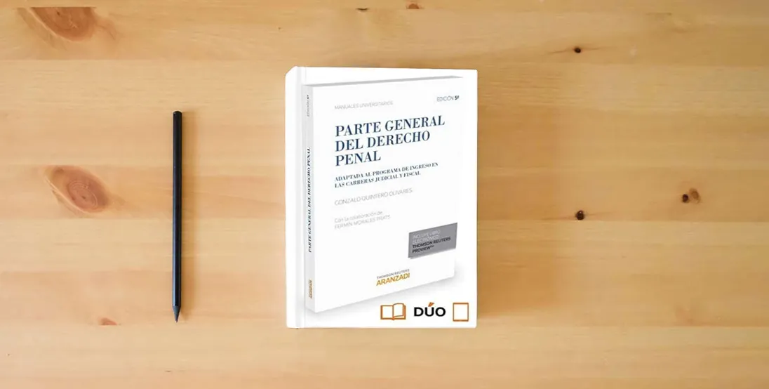 The book Parte General del Derecho Penal (Manuales)} is on the table