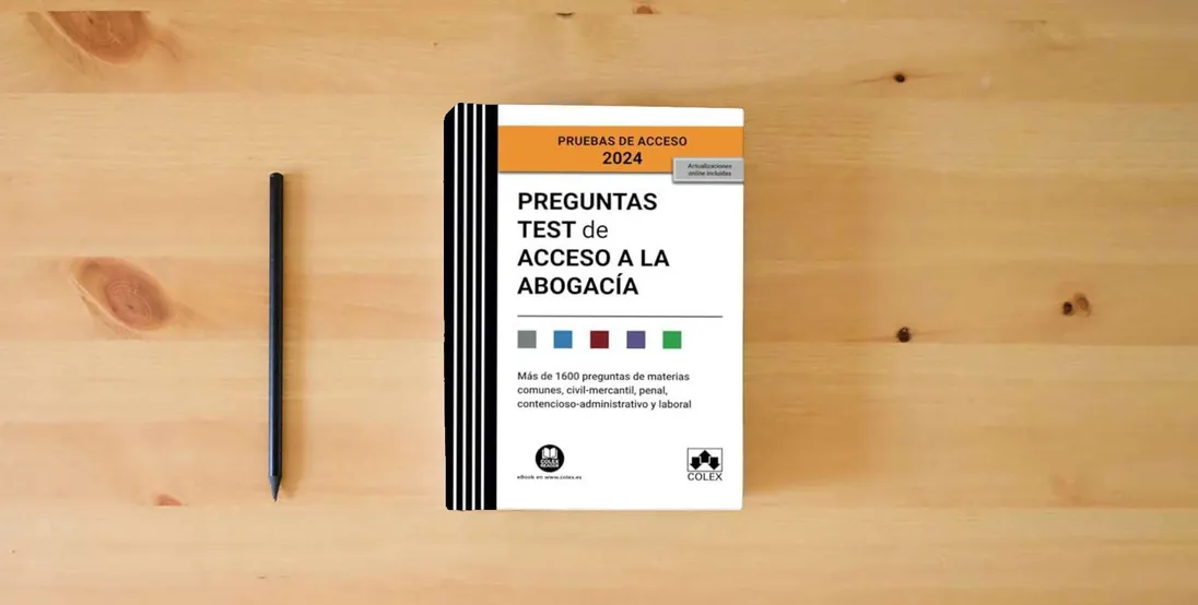 The book Preguntas test de Acceso a la abogacía (EXAMEN 2024) 2.ª ED (Campus Opositor)} is on the table
