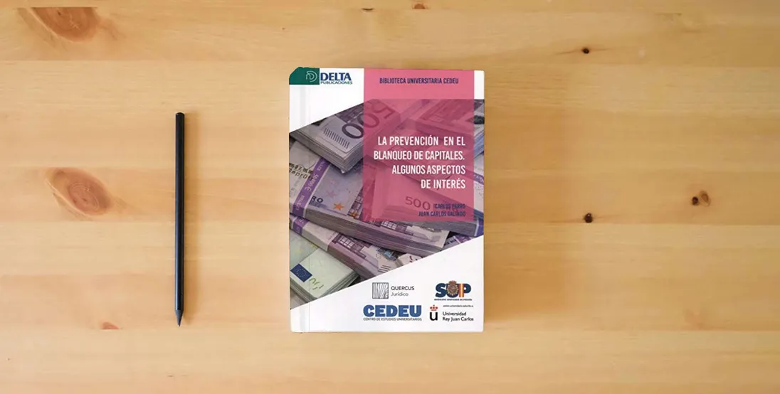 The book LA PREVENCIÓN DEL BLANQUEO DE CAPITALES: Algunos aspectos de interés (DELTA)} is on the table
