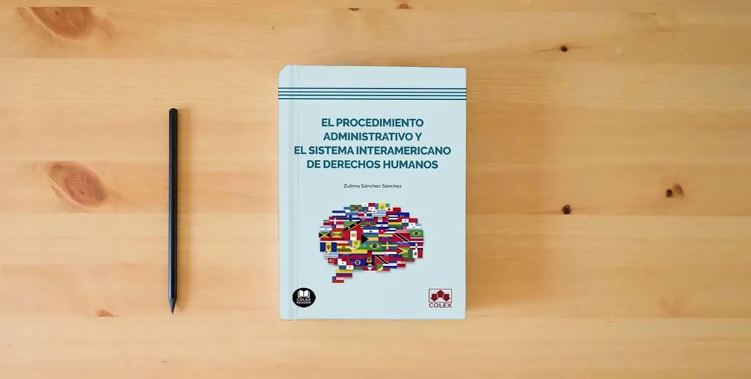 The book El procedimiento administrativo y el Sistema Interamericano de Derechos Humanos (Bolsillo)} is on the table