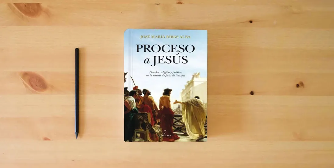 The book Proceso a Jesus: Derecho, religión y política en la muerte de Jesús Nazaret: 1 (Historia)} is on the table