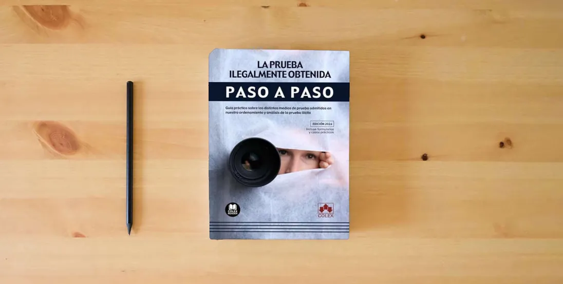 The book La prueba ilegalmente obtenida. Paso a paso: Guía práctica sobre los distintos medios de prueba admitidos en nuestro ordenamiento y análisis de la prueba ilícita} is on the table