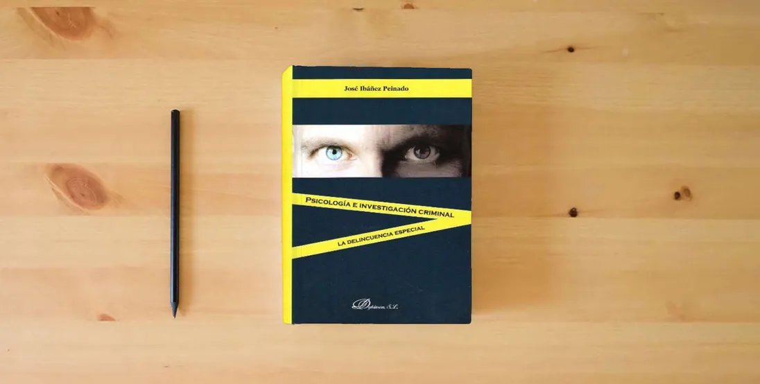 The book Psicología e investigación criminal: La delincuencia especial (SIN COLECCION)} is on the table