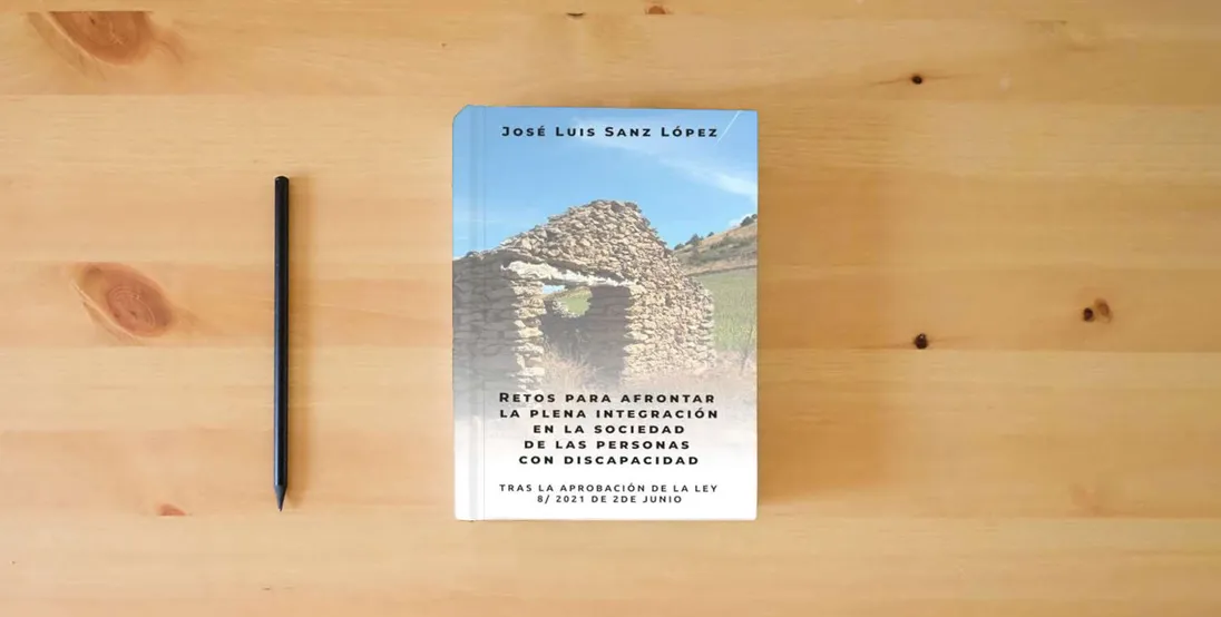 The book Retos para afrontar la plena integración en la sociedad de las personas con discapacidad: Tras la aprobación de la ley 8/2021 de 2 Junio} is on the table