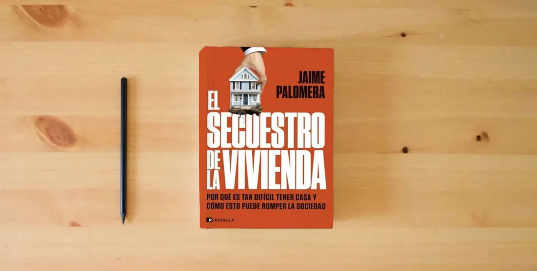 The book El secuestro de la vivienda: Por qué es tan difícil tener casa y cómo esto puede romper la sociedad (PENINSULA)} is on the table