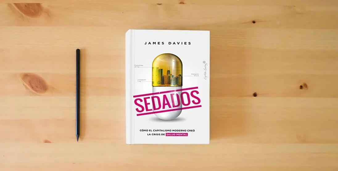The book Sedados (2ª ED): Cómo el capitalismo moderno creó la crisis de salud mental (ENSAYO)} is on the table