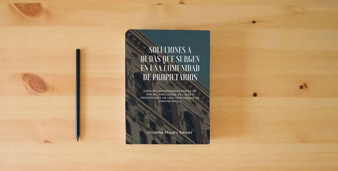 The book SOLUCIONES A DUDAS QUE SURGEN EN UNA COMUNIDAD DE PROPIETARIOS: Dirigido a administradores de fincas, abogados, vecinos y presidentes de comunidad} is on the table