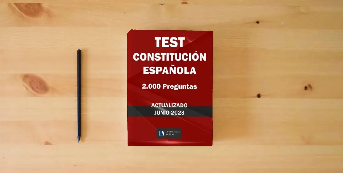 The book TEST CONSTITUCIÓN ESPAÑOLA. 2.000 PREGUNTAS. ACTUALIZADO. Legislación Actual. Para estudiantes y opositores.: Tamaño 8,5”x 11”} is on the table