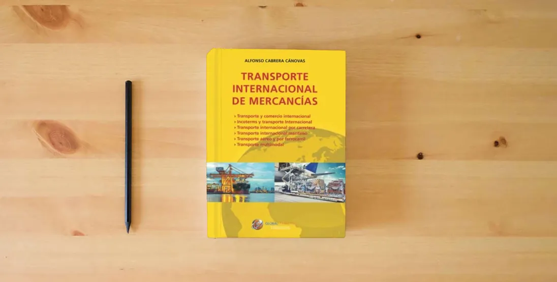The book Transporte internacional de mercancías (ECONOMIA)} is on the table