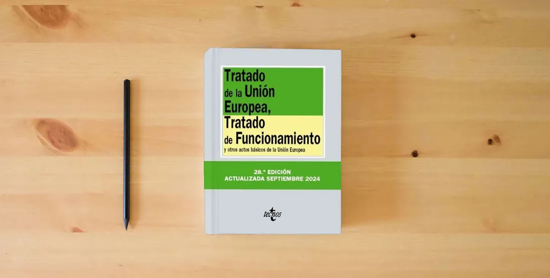 The book Tratado de la Unión Europea, Tratado de Funcionamiento: y otros actos básicos de la Unión Europea (Derecho - Biblioteca de Textos Legales)} is on the table