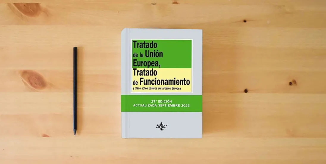 The book Tratado de la Unión Europea, Tratado de Funcionamiento: y otros actos básicos de la Unión Europea (Derecho - Biblioteca de Textos Legales)} is on the table