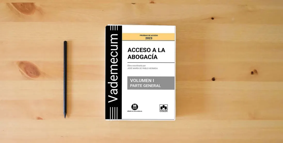 The book Vademecum Acceso a la abogacía. Volumen I. Parte general: Temario desarrollado de las materias comunes del examen de acceso a la abogacía: 1} is on the table