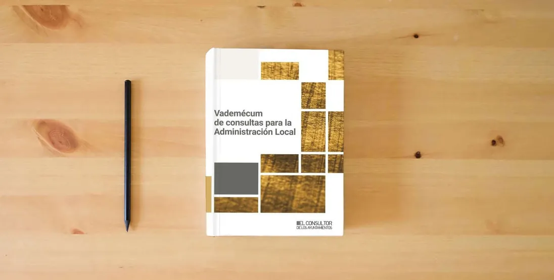 The book Vademécum de consultas para la Administración Local (SIN COLECCION)} is on the table