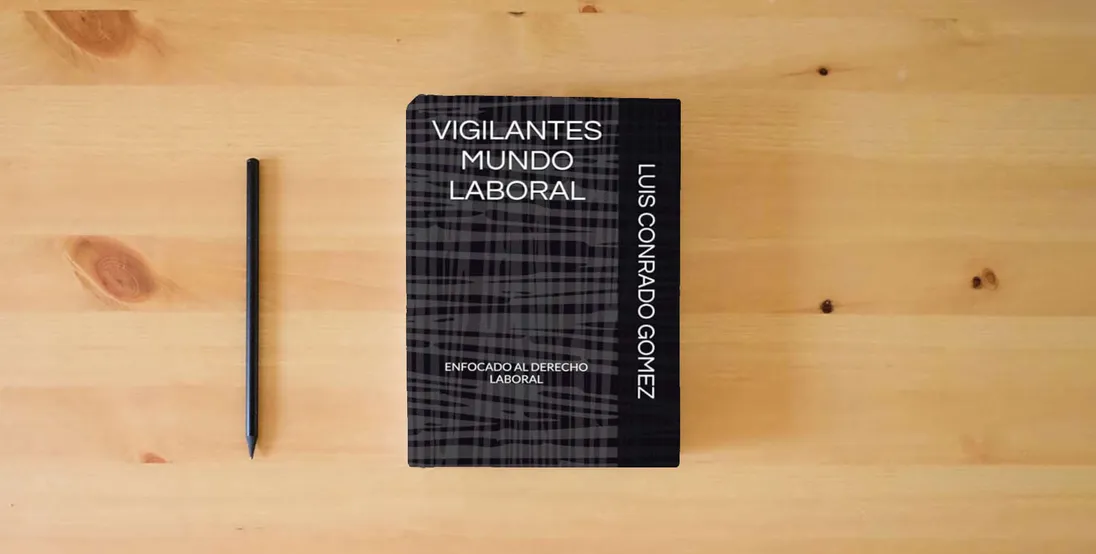 The book VIGILANTES MUNDO LABORAL} is on the table
