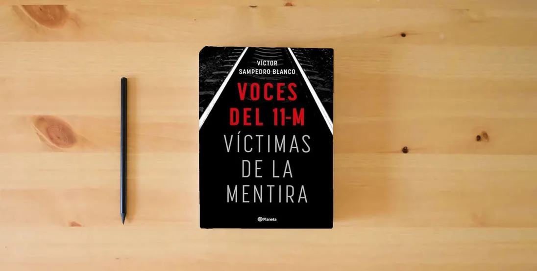 The book Voces del 11-M: Víctimas de la mentira (No Ficción)} is on the table